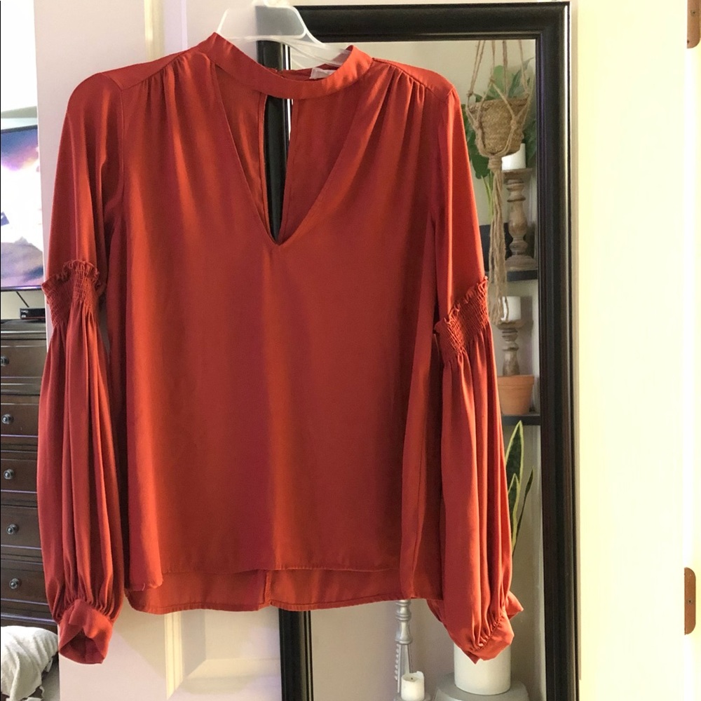 Beautiful Burnt Orange cutout blouse